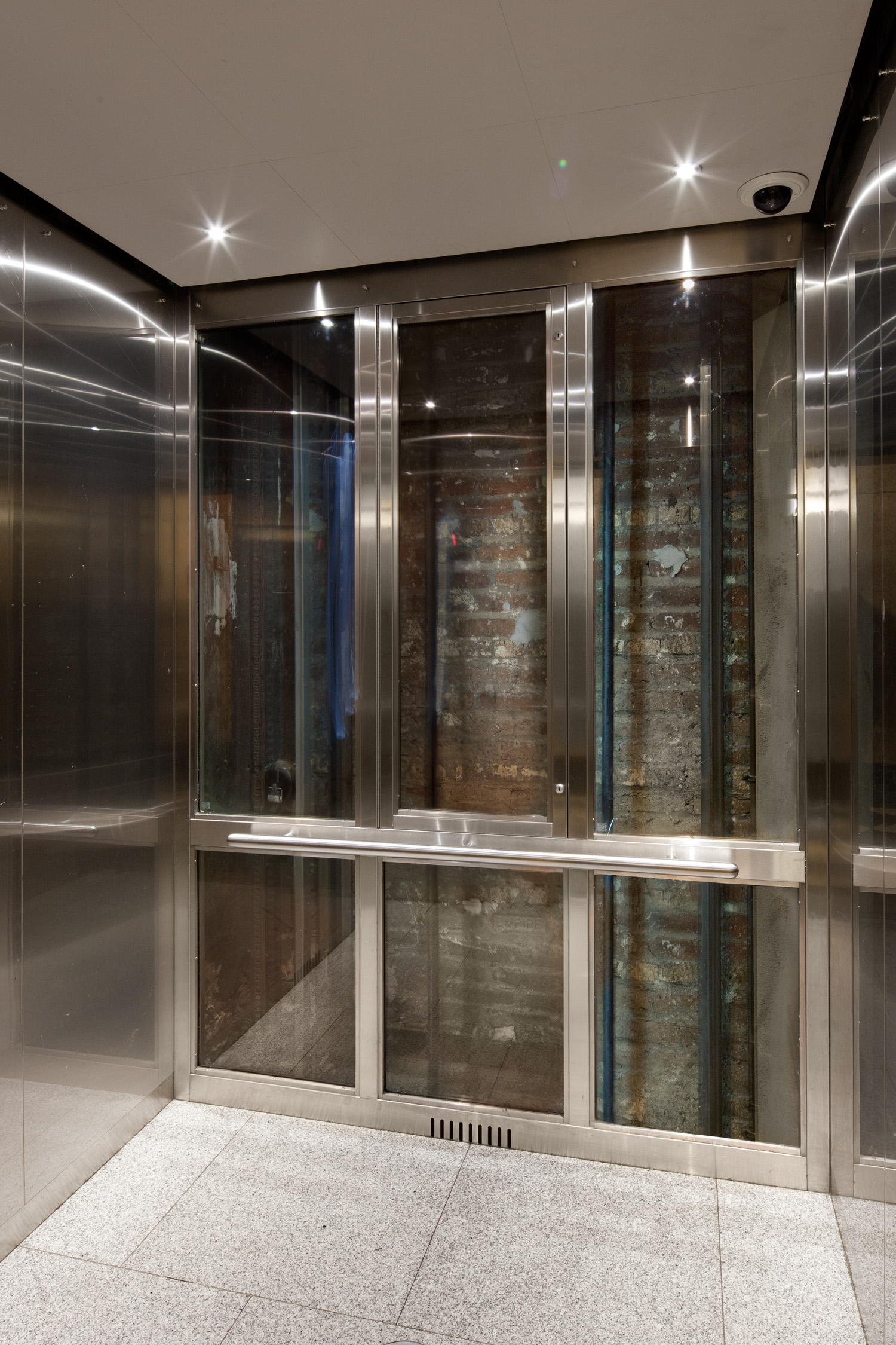Stainless steel and glass elevators